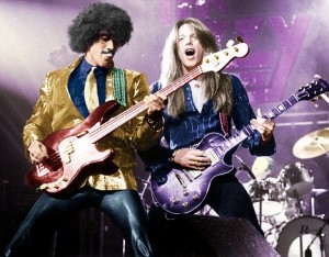 Phil Lynott (left), pictured on stage with Thin Lizzy.